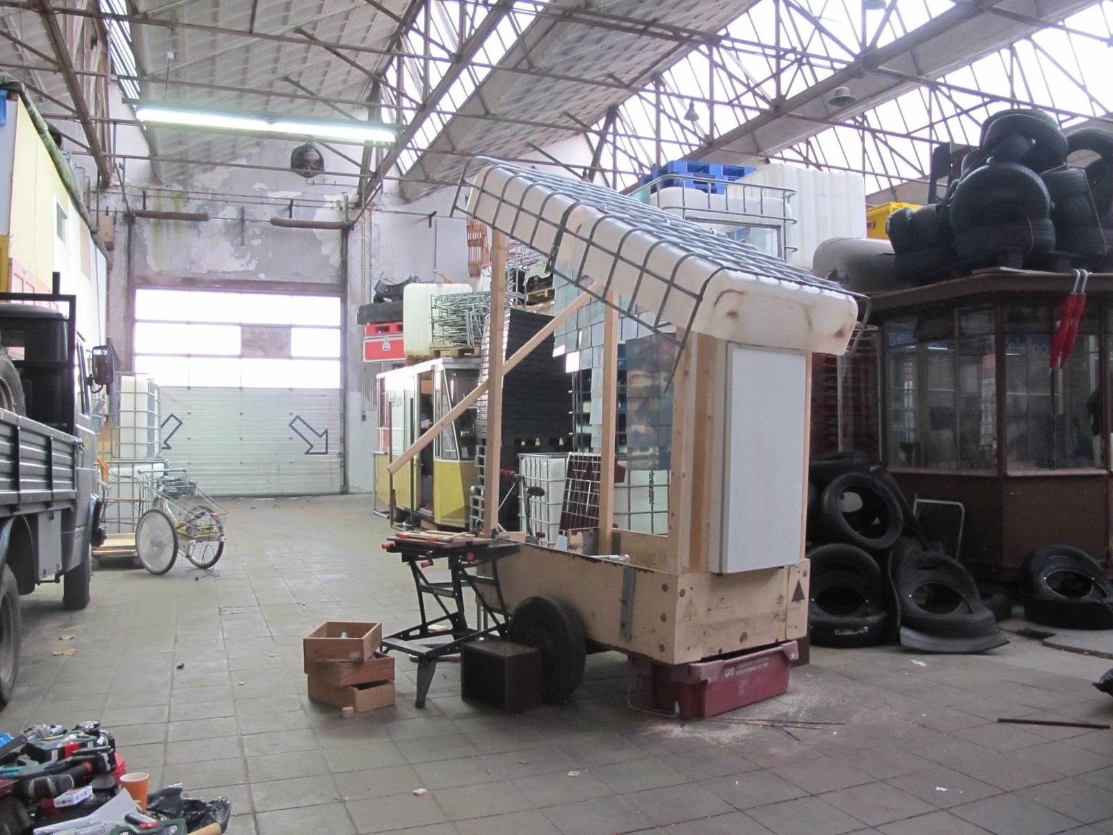 The house on its wheels, roof on, late in the afternoon