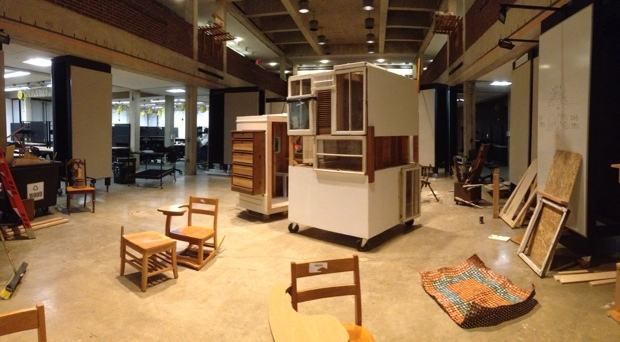 An indoor build with chairs and a timber unit
